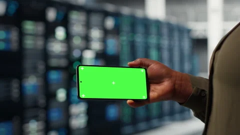 Software developer using app on mockup phone to do server hub checkup Video stock 317123686