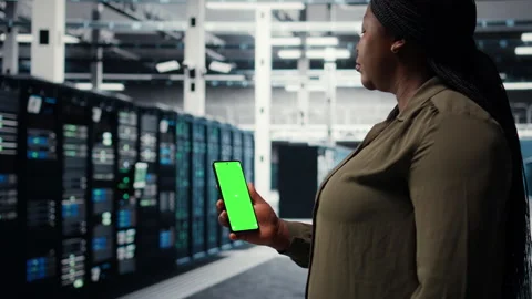 Software developer using app on mockup phone to do server hub checkup 스톡 동영상 317202627