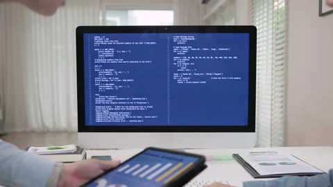 Software developer using generative AI automation code assistant help working Stock Footage 251875838