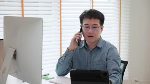 Software developer using generative AI automation code assistant help working Stock Footage 255692310