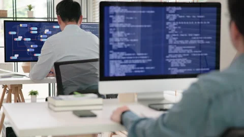 Software developer using generative AI automation code assistant help working Stock Footage 258716258