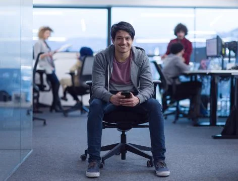 Software developer using mobile phone Stock Photos