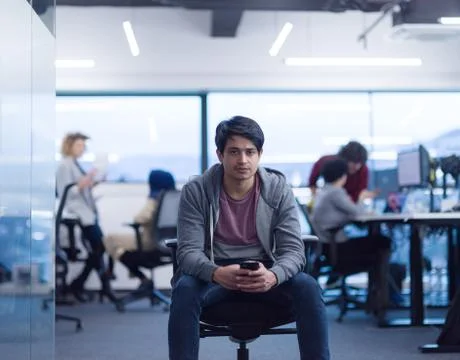 Software developer using mobile phone Stock Photos