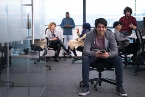 Software developer using mobile phone Stock Photos