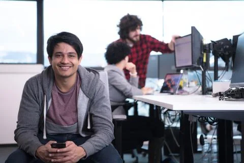 Software developer using mobile phone Stock Photos