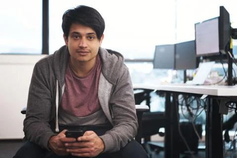 Software developer using mobile phone Stockfoto's