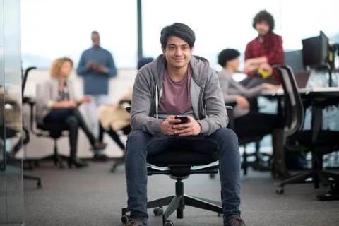 Software developer using mobile phone Stock Photos