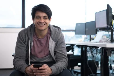 Software developer using mobile phone Stock Photos