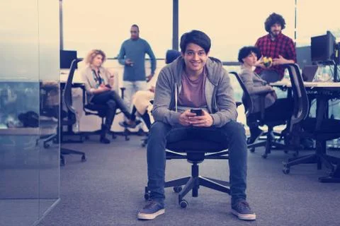 Software developer using mobile phone Stock Photos