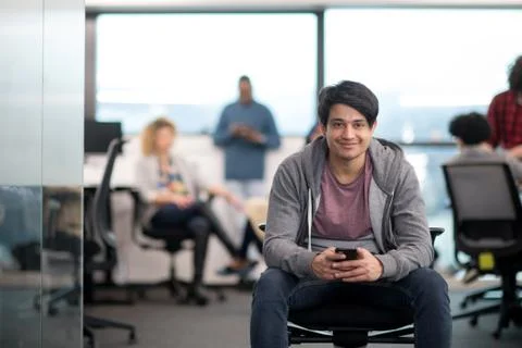Software developer using mobile phone Stock Photos