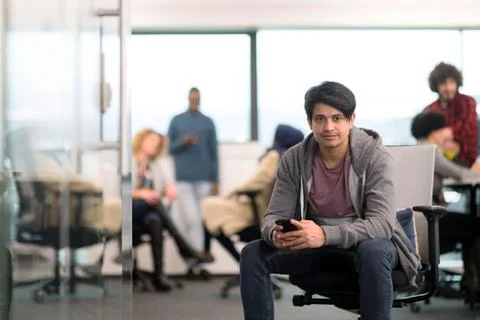 Software developer using mobile phone Stock Photos