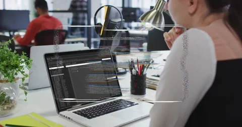 Software developer watching laptop while glitching HUD appearing, warping code Stock Footage 332275849