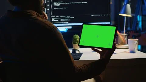 Software developer watching programming video tutorial on isolated screen tablet Stock Photos