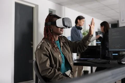 Software developer wearing with vr heaset to create programming server Stock Photos