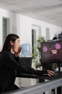 Software developer woman having web server hacked 写真素材