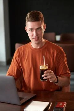 Software Developer Working at Cafe Tble Stock Photos