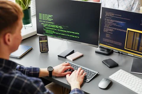 Software developer working with codes on computer Foto stock