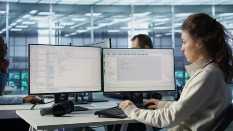 Software developer working in computer network security data center Stock Footage 319242347