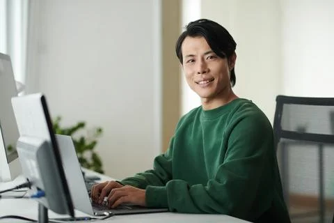 Software Developer Working on Computer Stock Photos