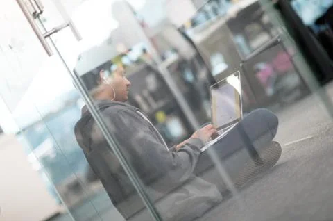 Software developer working on the floor Foto stock