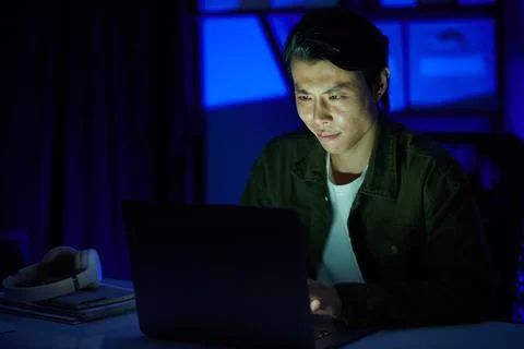 Software Developer Working at Night Stock Photos