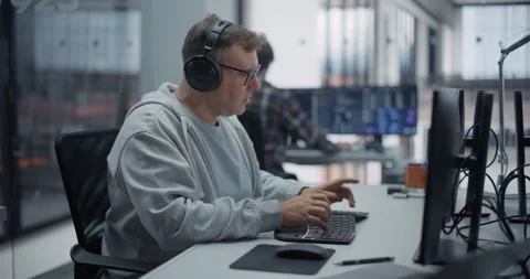 Software Developer Working in Office Stock Footage 296184657