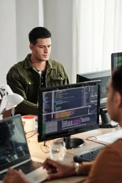 Software Developer Working in Office Stock Photos