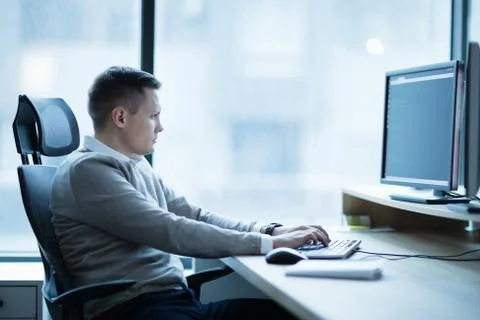 Software developer working on project in office Foto stock