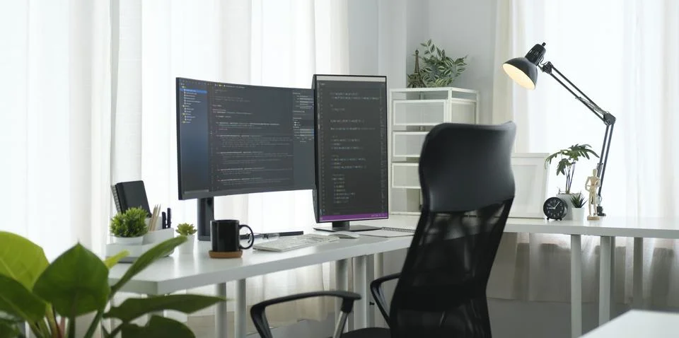 Software developer workplace with program code on wide displays. Coding, pr.. 写真素材