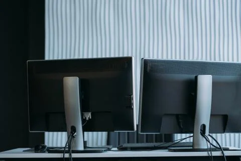 Software developer workplace two monitors office 스톡 사진