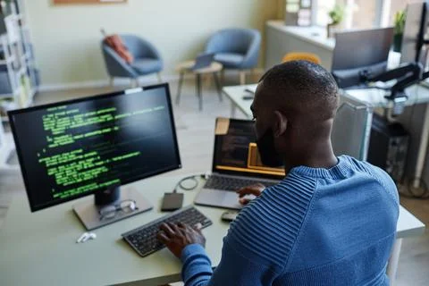 Software Developer Writing Code Back View Stock Photos