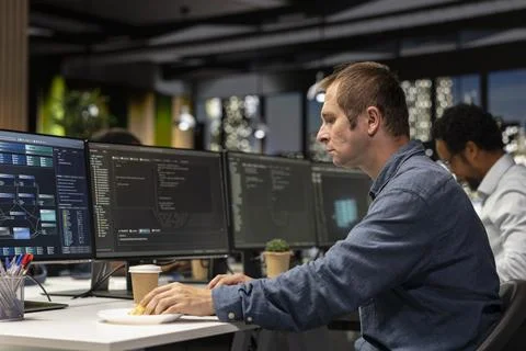 Software developer writing code, developing machine learning APIs Foto stock