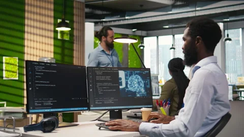 Software developer writing code on PC, developing deep learning APIs Stock Footage 313016527