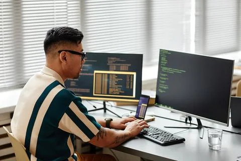 Software Developer Writing Code Stock Photos