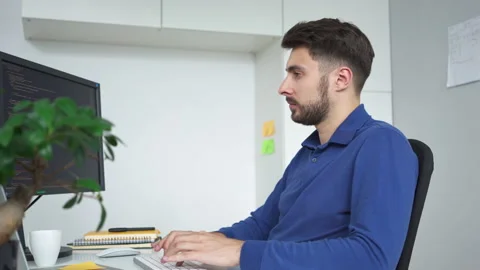Software developer writing code working from home office Stock Footage 162468949