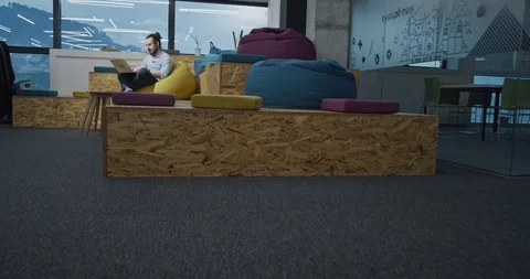 Software developer writing programming code using laptop computer while sitti Stock Footage 114048451