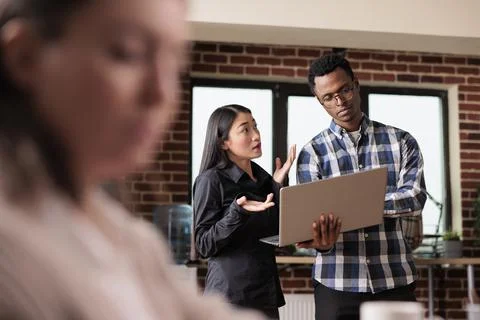 Software developers analyzing received encrypted files by scanning them for Stock Photos