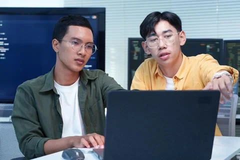 Software Developers Collaborating on AI Technology Stock Photos