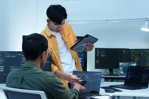 Software Developers Collaborating on an Artificial Intelligence Project Stock Photos