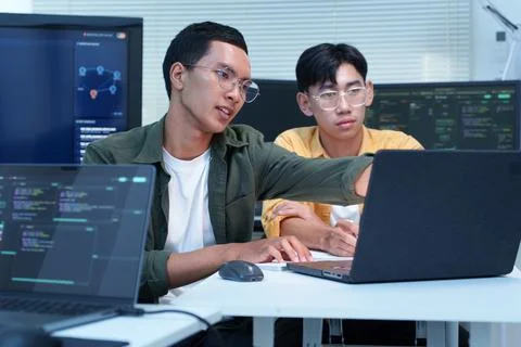 Software Developers Collaborating on Artificial Intelligence Technology Stock Photos