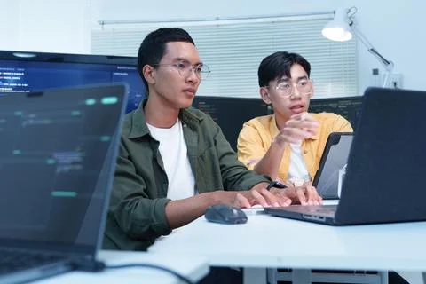 Software Developers Collaborating on Programming and Technology Project Stock Photos