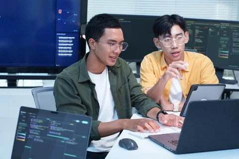 Software Developers Collaborating on Programming Project Photos