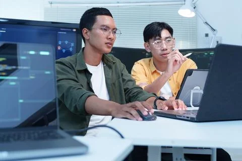 Software Developers Collaborating on Technology Project Fotos Stock