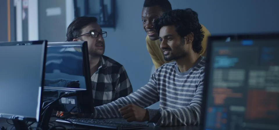 Software developers coordinating a project Stock Photos