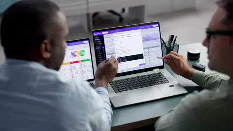 Software Developers Discuss Bug Tracking Issues Stock Footage 346927756