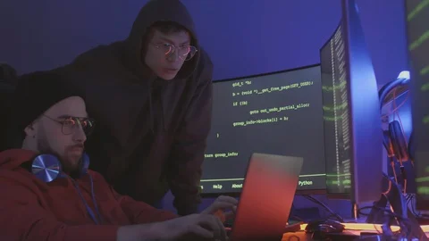Software Developers Discussing Program Code Stock Footage 129813594