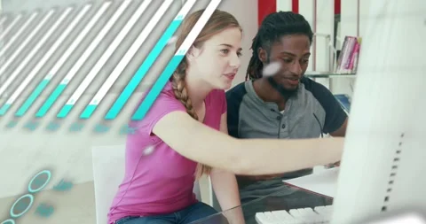 Software developers leaning in at desk and activating code overlays while Stock Footage 317800267