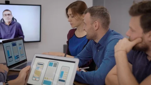 Software developers for mobile phones are listening chief specialist by video Stock Footage 120724744