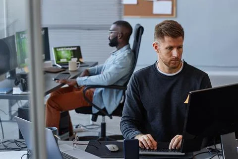 Software Developers in Office Stock Photos