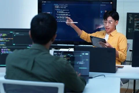 Software Developers Presenting Code and Artificial Intelligence Project Fotos Stock